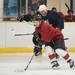 Firefighter Jason Raschke skates the puck down the ice during the Washtenaw County police and firefighter's Guns-n-Hoses charity hockey game, Sunday Jan 13.
Courtney Sacco I AnnArbor.com 